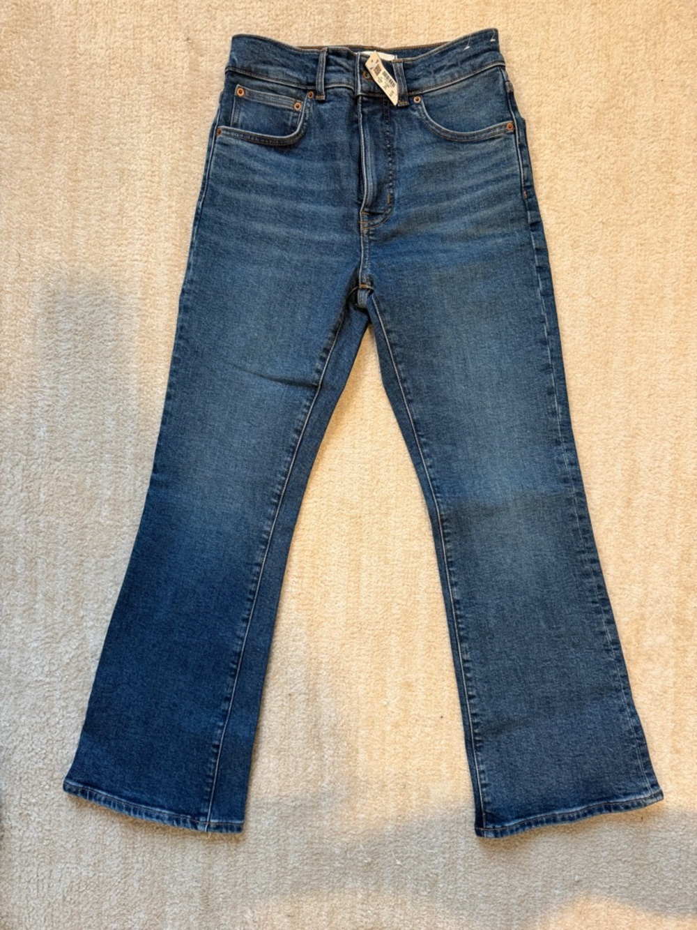 NWT:  MADEWELL Women’s Vintage Flare Crop Jean in dark-rinse. Size 24